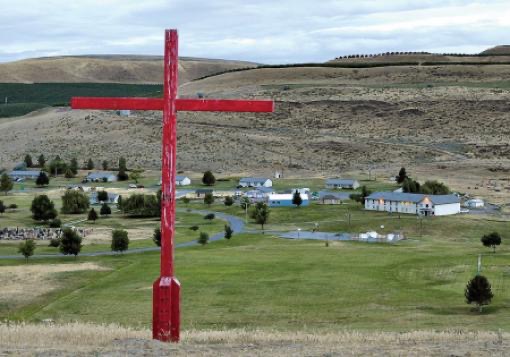 A photo of the cross at the top of the hill overlooking Jubilee Youth Ranch