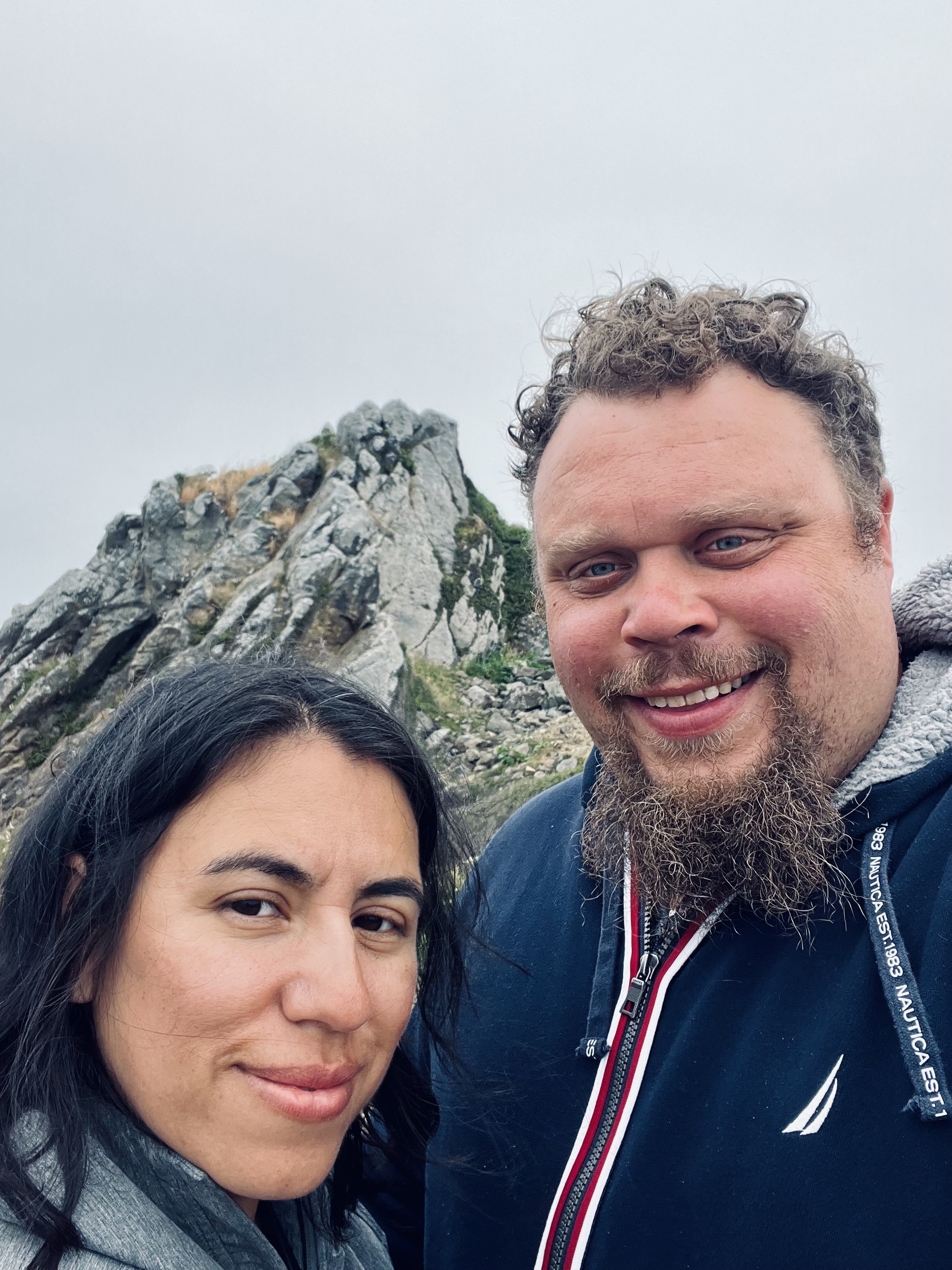 Jacob and Belinda in from of a craggy cliff