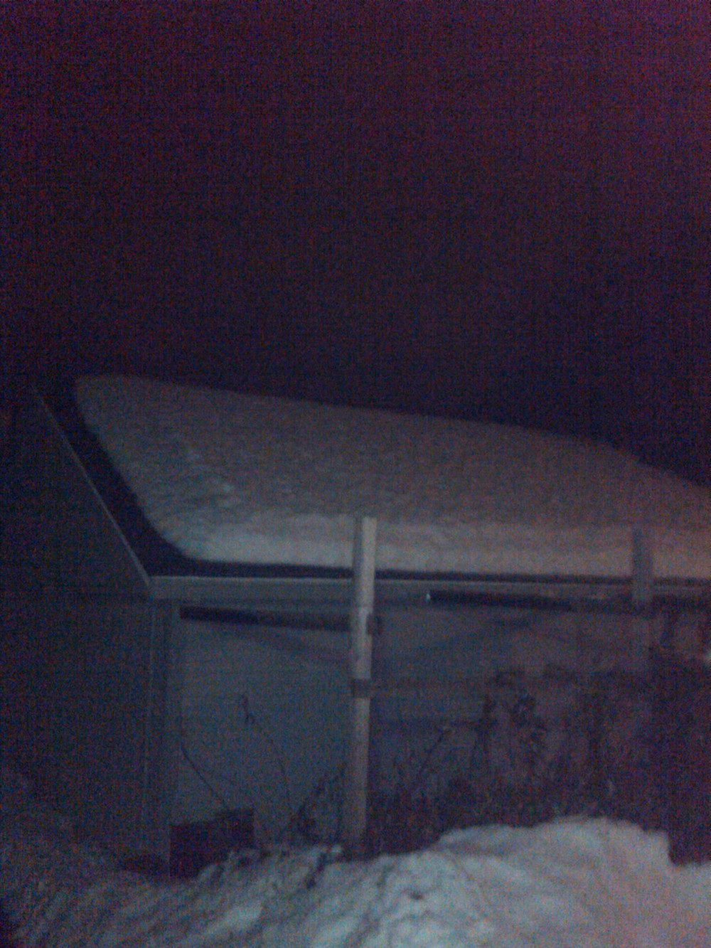  Snow on my garage's roof.
