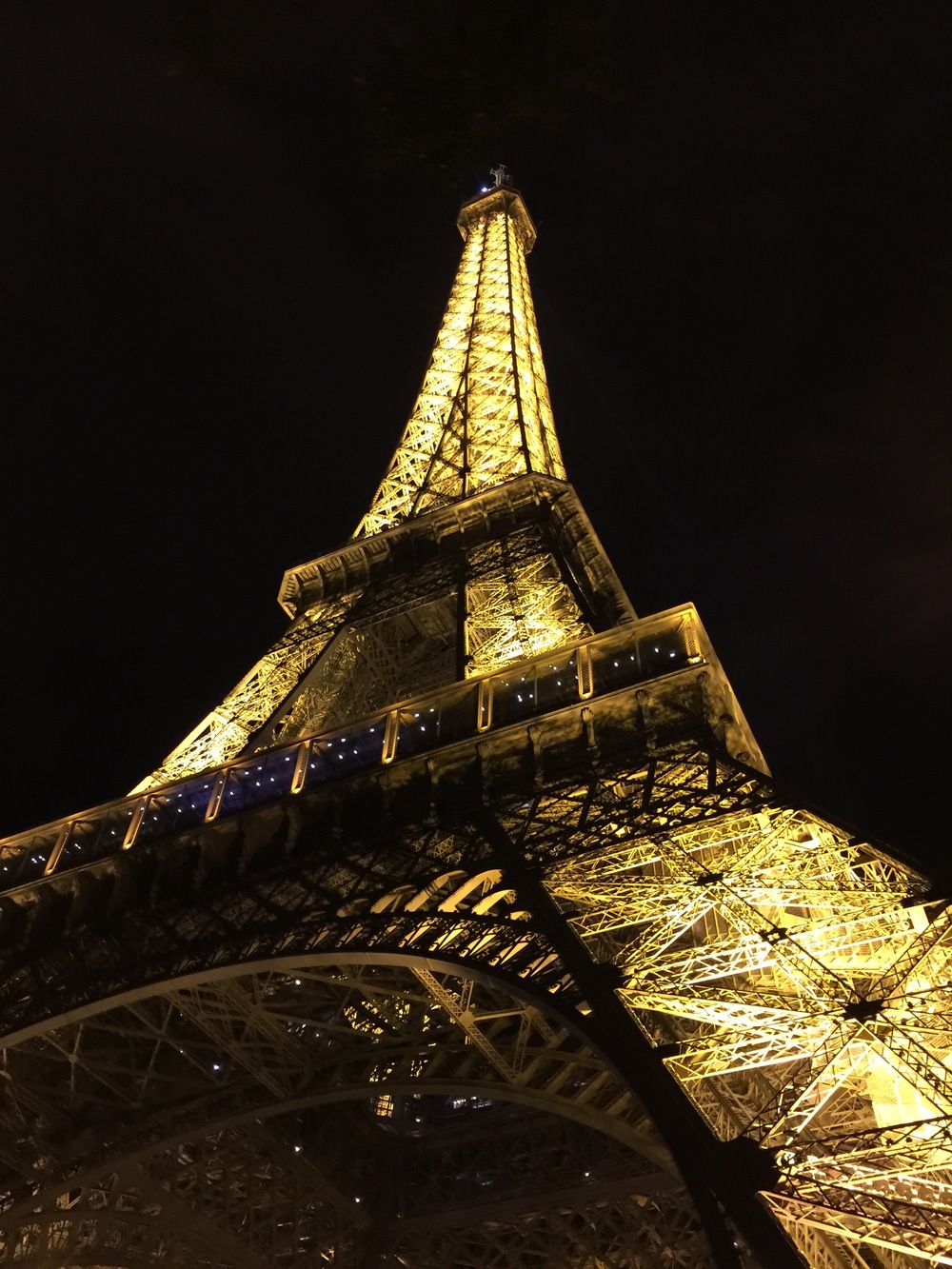 A photo from the base of the Eiffel Tower.